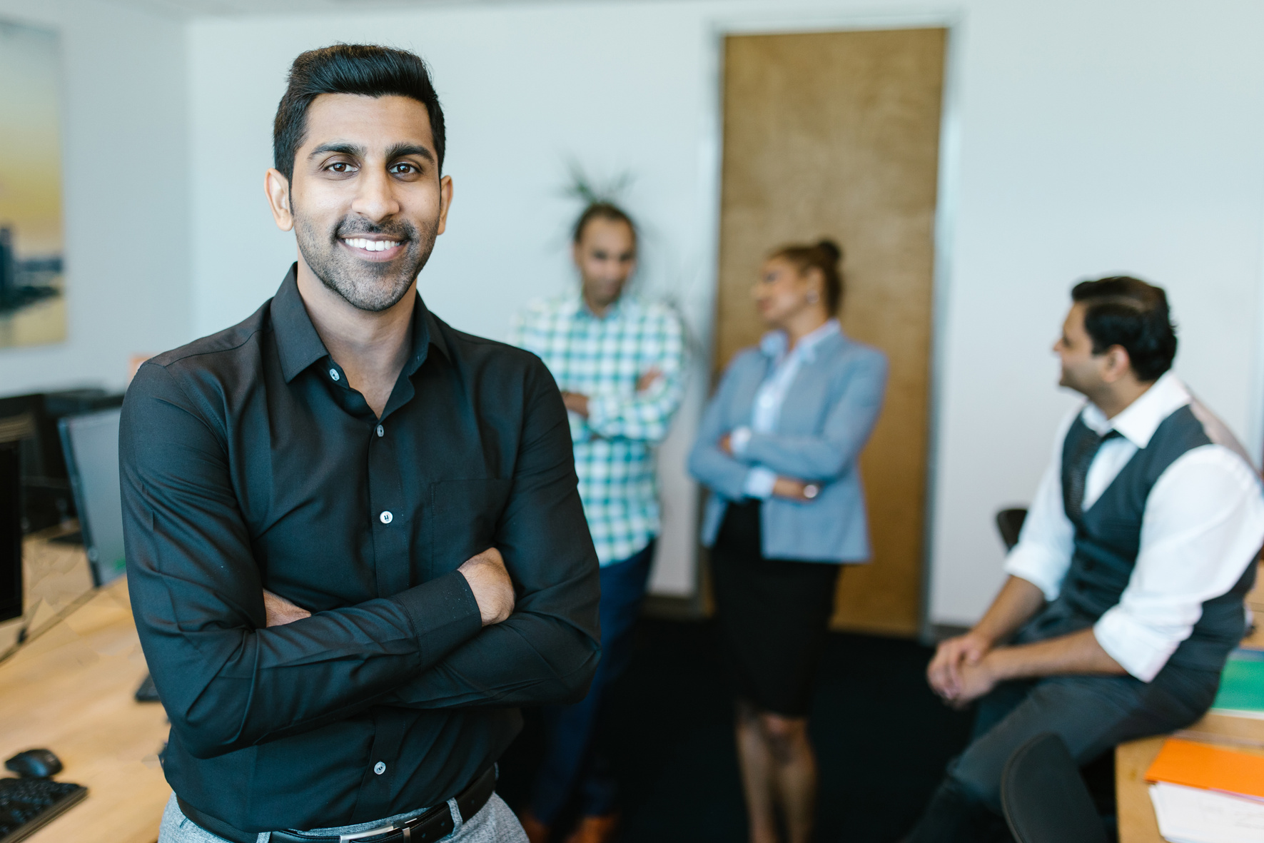 Man in Black Dress Shirt Smiling